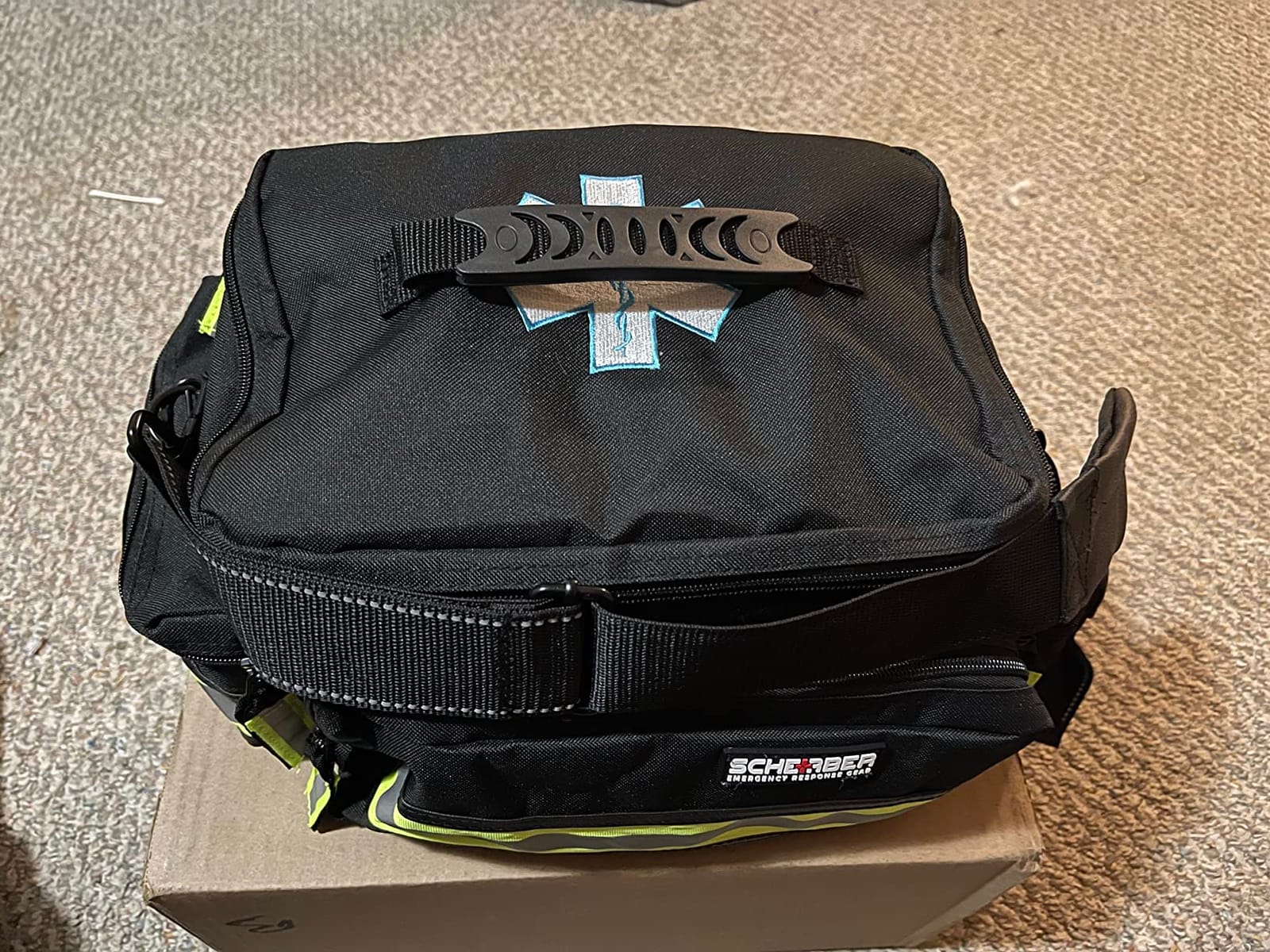 Scherber First Responder Fully-Stocked Professional Essentials EMT/EMS Trauma Kit | HSA/FSA Approved | Reflective Bag w/8 Zippered Pockets & Compartments & 200+ First Aid Supplies - Red customer photo 1