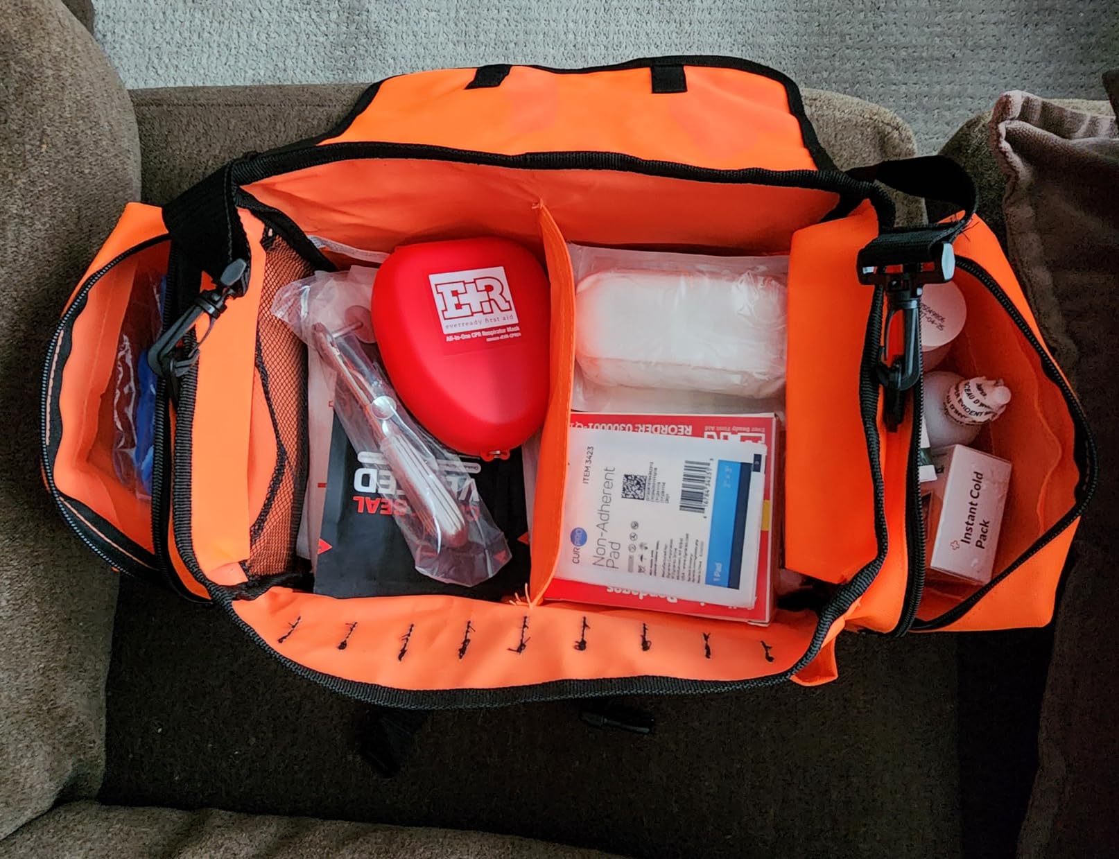 Fully Stocked EMT Trauma Bag - Tactical First Responder Medical Kit with Tourniquet, Chest Seals, Bleeding Control, Gauze, Shears & Bandages - Orange customer photo 1