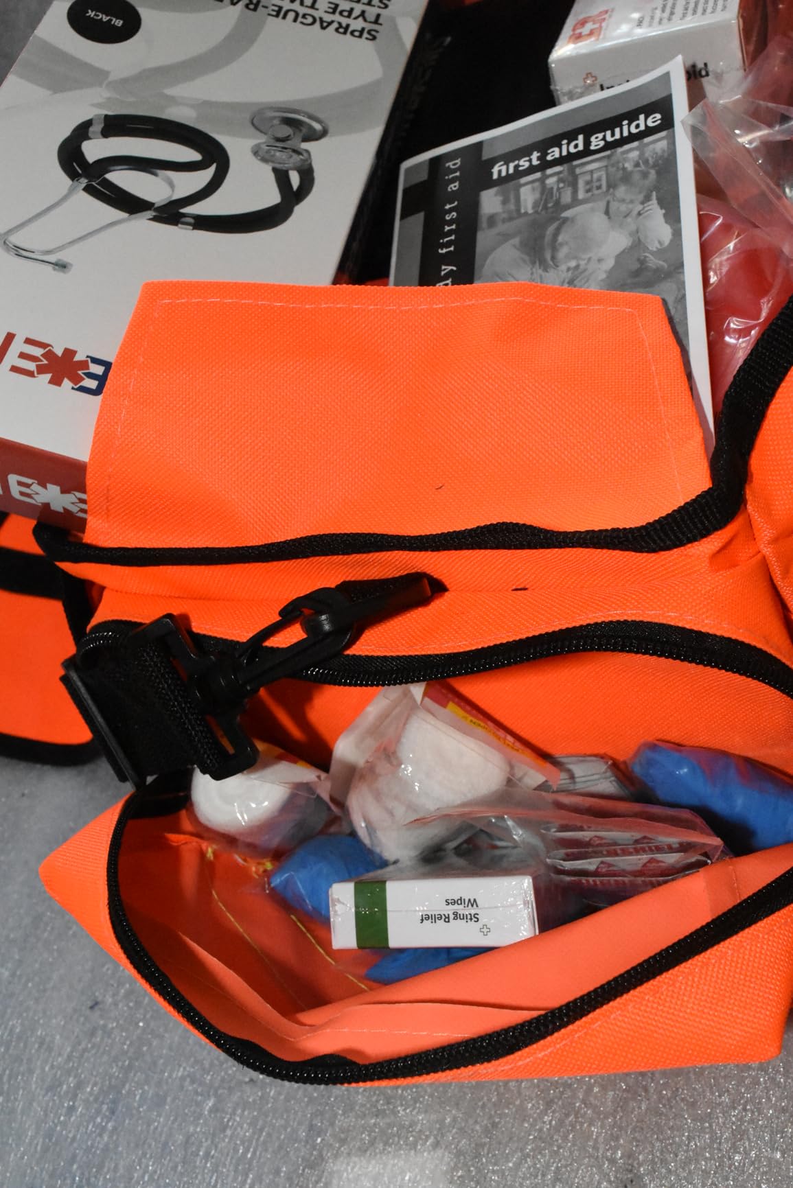 Fully Stocked EMT Trauma Bag - Tactical First Responder Medical Kit with Tourniquet, Chest Seals, Bleeding Control, Gauze, Shears & Bandages - Orange customer photo 2