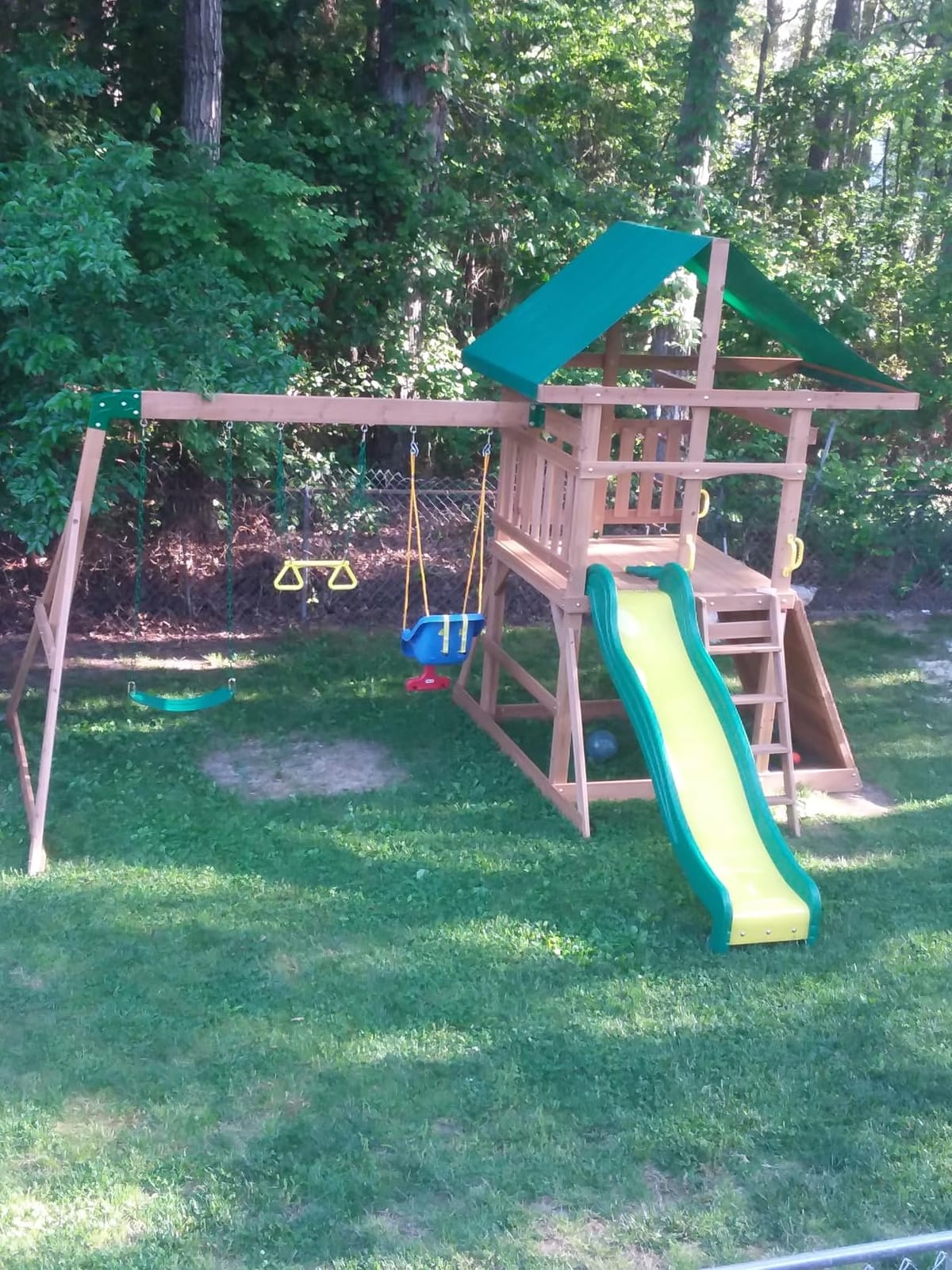 Backyard Discovery Mount Mckinley Cedar Wood Swing Set with Wave Slide, Play Deck, Double Rock Wall, Rope Ladder, Web Swing, Belt Swings, Toy Telescope, Steering Wheel, Sandbox Area, Outdoor Playset customer photo 2