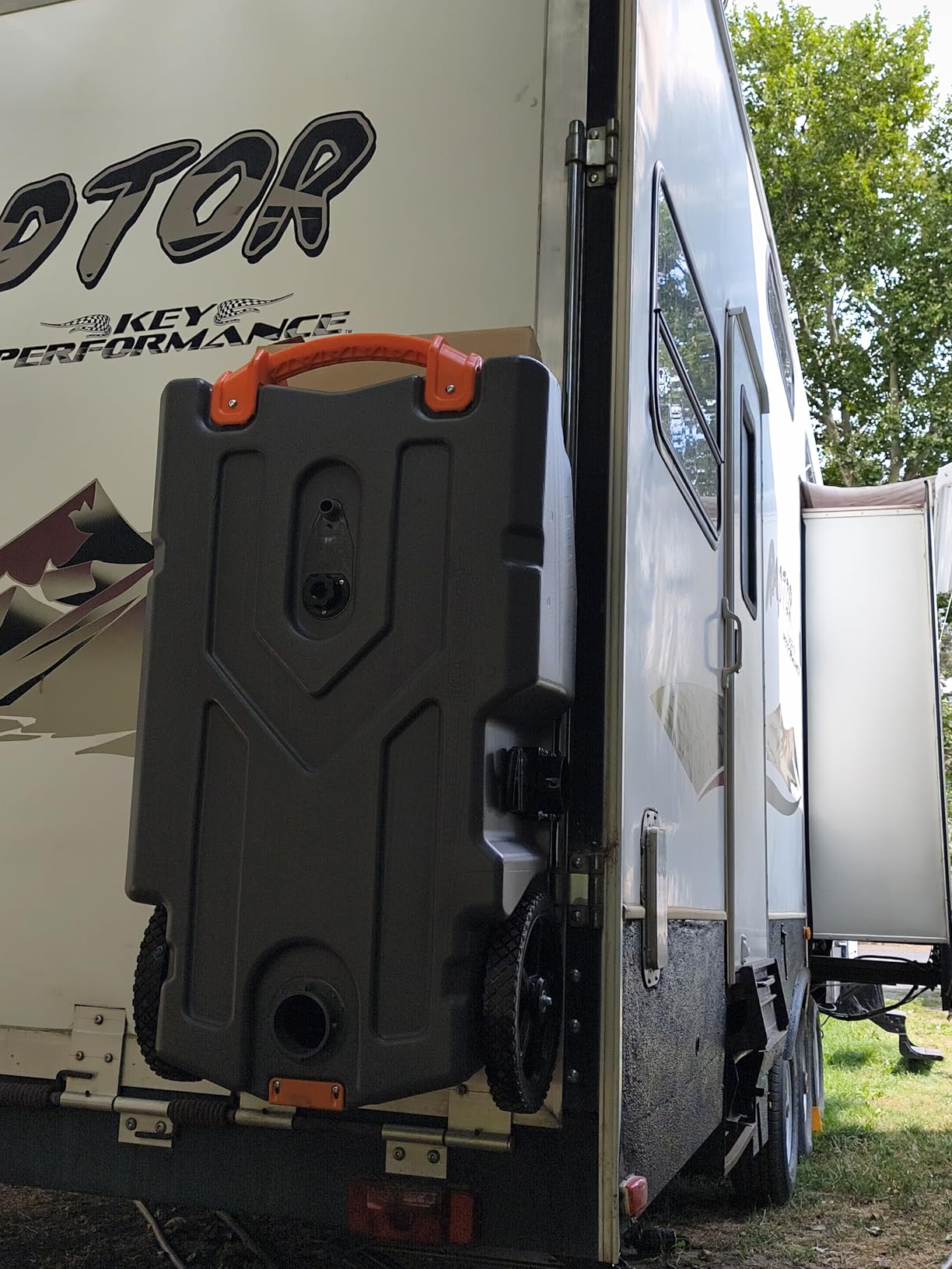 Camco Rhino 28-Gallon Camper/RV Tote Tank - Features Large Heavy-Duty No-Flat Wheels & Built-in Gate Valve - Removable Steel Tow Adapter, 3’ Sewer Hose & More RV Accessories (39004) customer photo 1