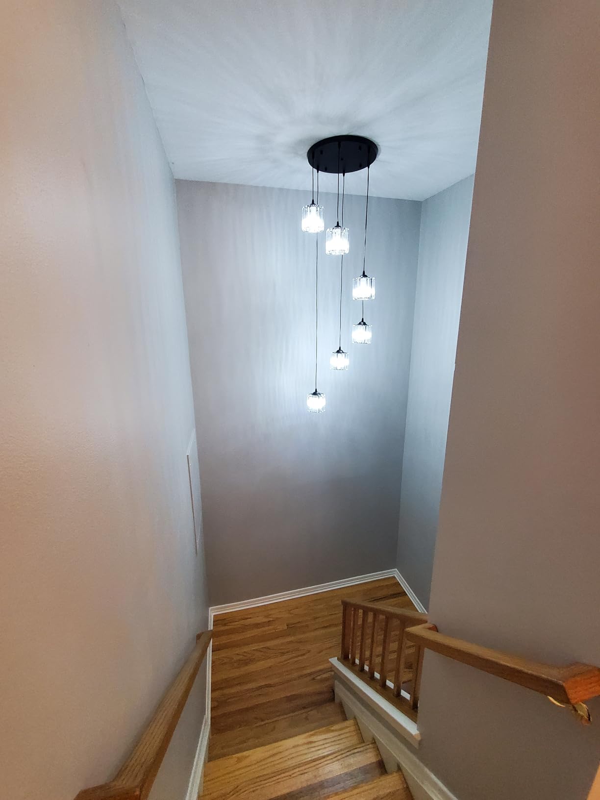 Long Chandeliers for High Ceilings,Modern Crystal Pendant Light,Raindrop Drop Lamp,Hanging Flush Mount Lighting Fixtures for Spiral Staircase,Foyer,Entryway,Living Room,Black (8 Lights) customer photo 2