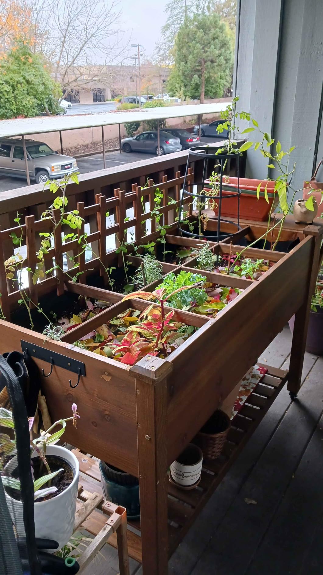 ketive Raised Garden Bed with Lockable Wheels Mobile Elevated Wood Planter,Storage Shelf, Protective Liner,55.5x24x32in (Brown) customer photo 1