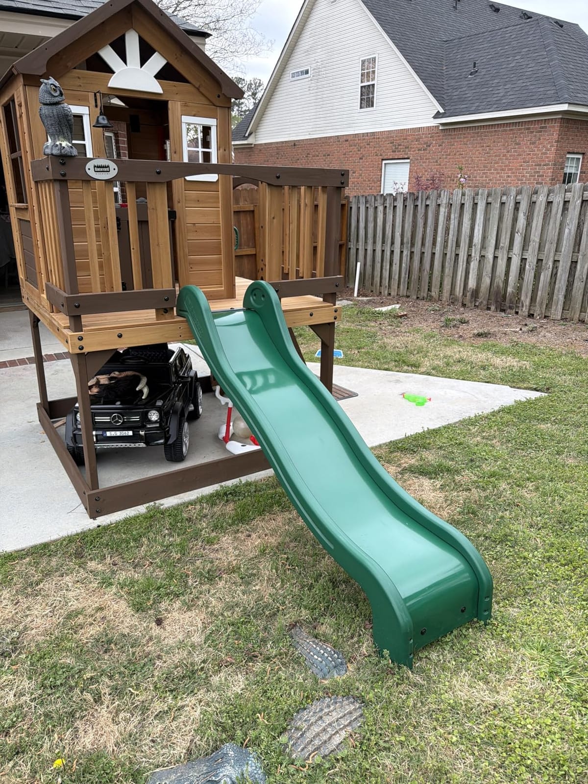 Backyard Discovery Beacon Heights Elevated Cedar Wooden Kids Playhouse with Wave Slide, Play Kitchen, Wrap-Around Deck, Flat-Step Ladder, Half Door, Windows, Bell, and Growth Chart for Outdoor Play customer photo 2